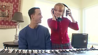 Cute strawberry blonde girl, Carolina West, is hot for her music teacher